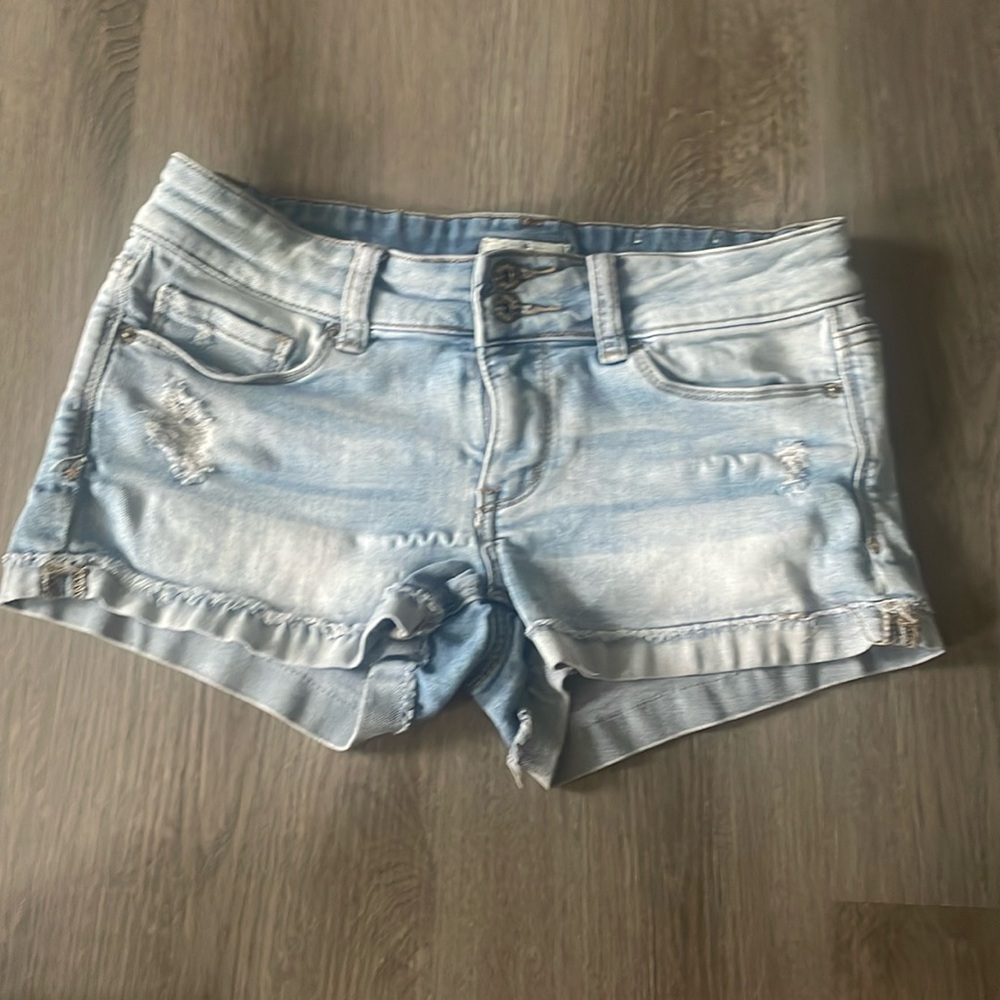 Jean shorts. Subtle distressing. Soft denim. Very comfortable
